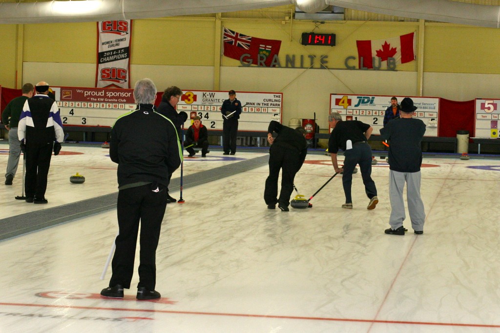 Doug Adams watches his rock