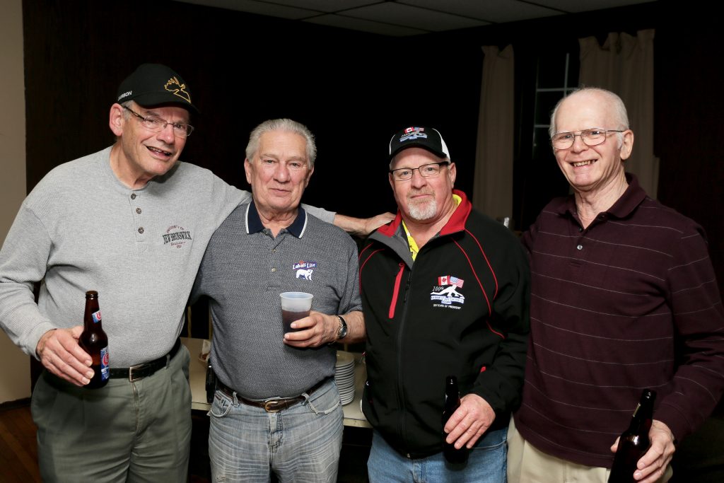 John Martin, Paul Sandford, Graham Wallbank (In the 100th jacket) and Peter Hartill